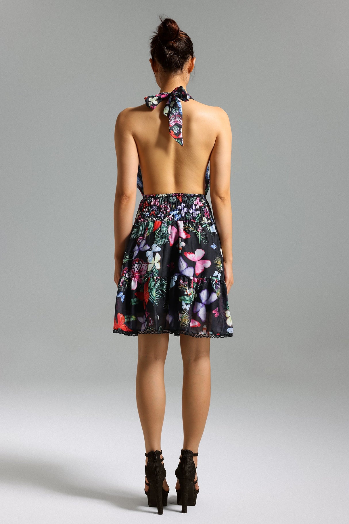 Tinsley Floral Mini Dress - Halter Neckline - Smocked Bodice - Flared Skirt - Vibrant Print