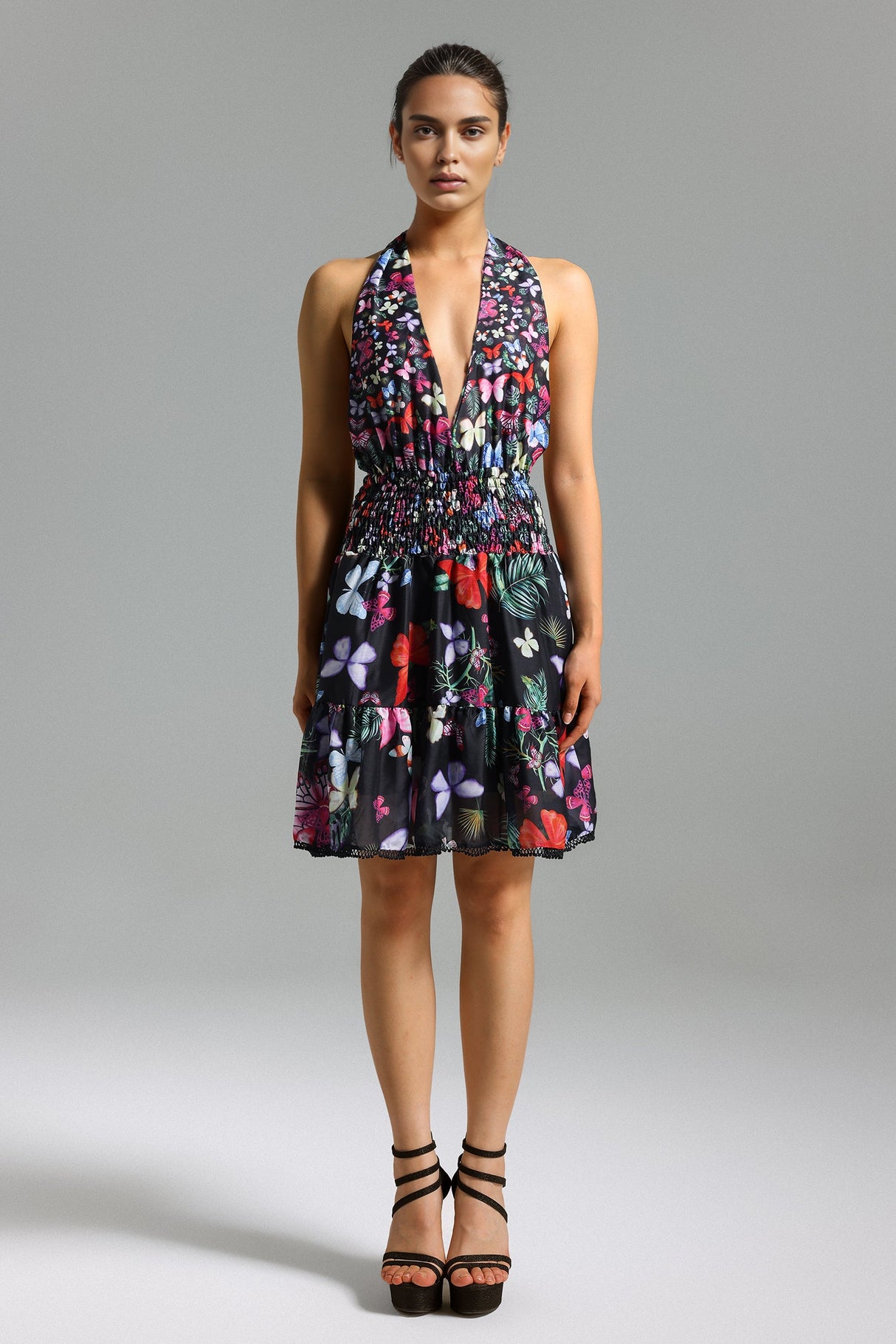 Tinsley Floral Mini Dress - Halter Neckline - Smocked Bodice - Flared Skirt - Vibrant Print