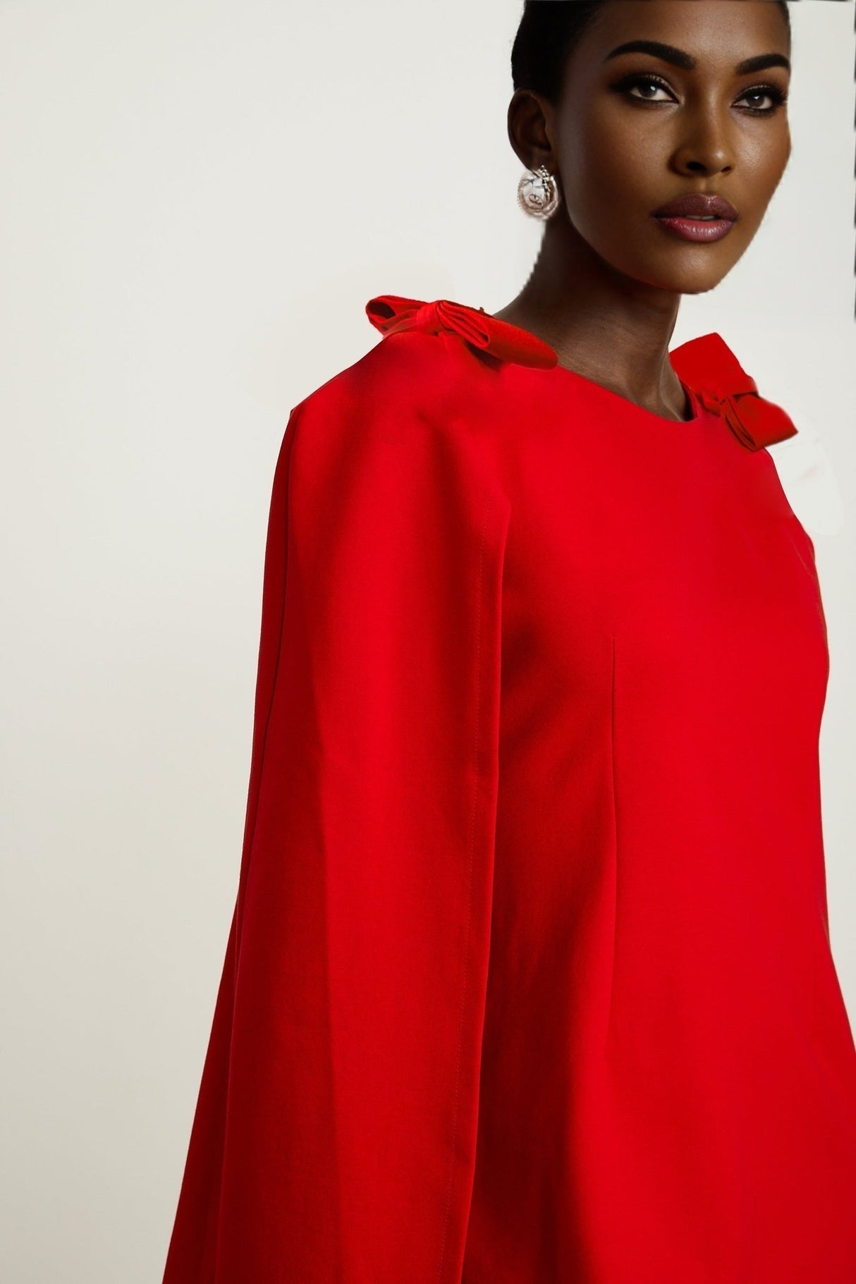 Alexandra Mini Dress - Boat Neckline - Long Sleeves - Cape Design - Bow Detailing