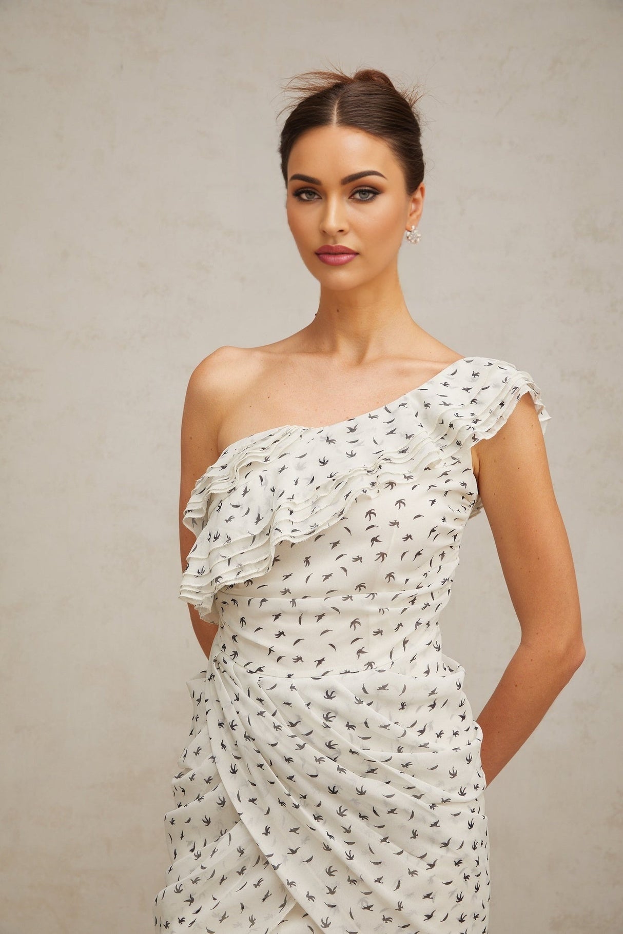 Angelina Mini Dress - One - shoulder design - Defined waistline - Stylish pattern - Delicate ruffled accents