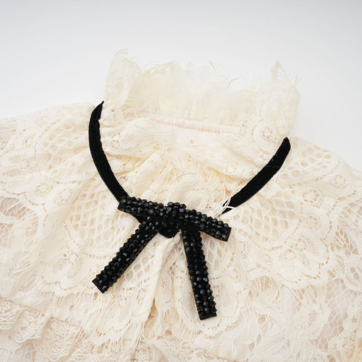 Antonietta Blouse - Flared Cuffs - Frilled Neck - Bow Detailing - Floral Lace Overlay - Cropped