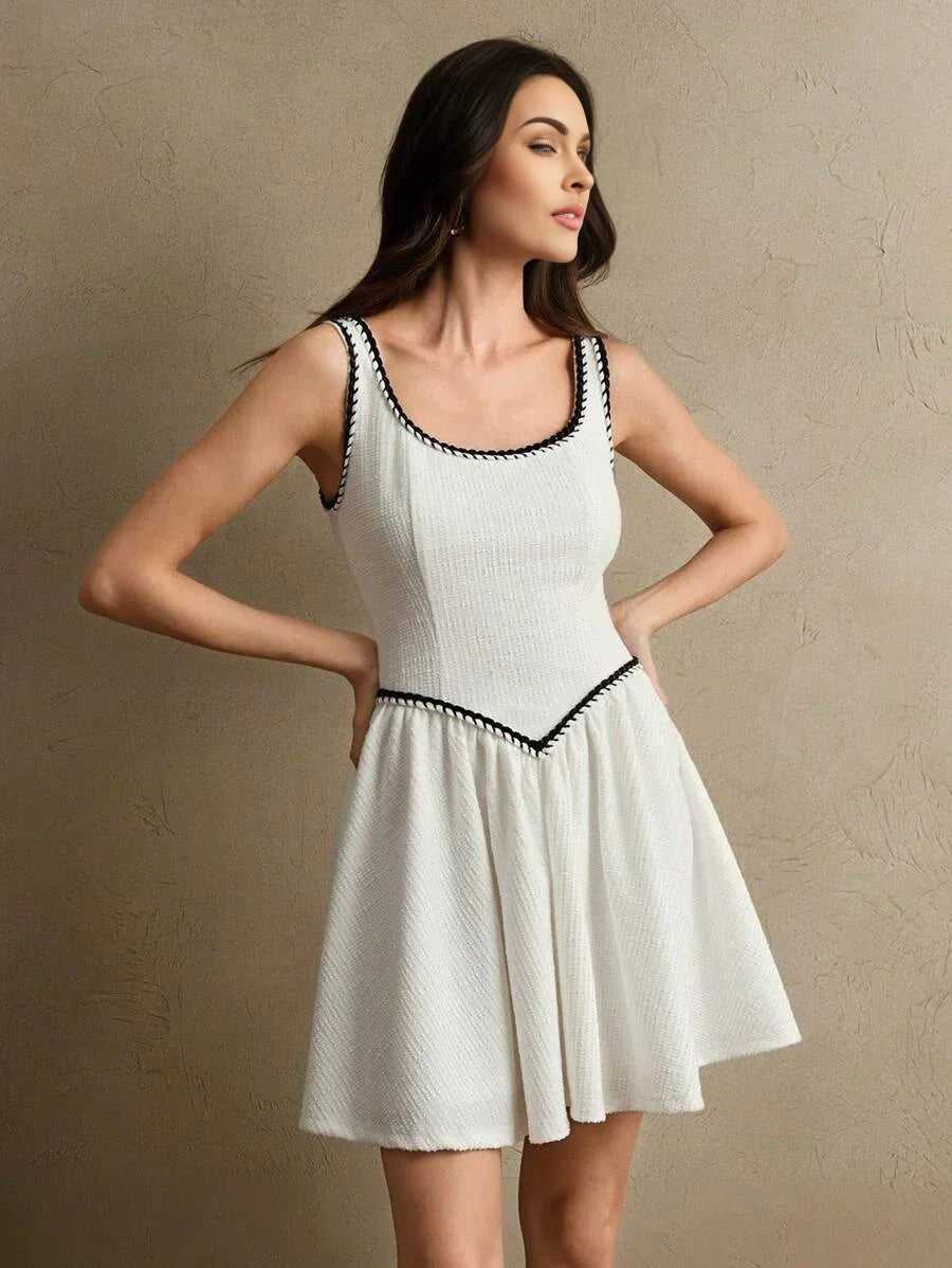 This stylish white dress features a fitted bodice with a square neckline and delicate black trim, creating a chic contrast..