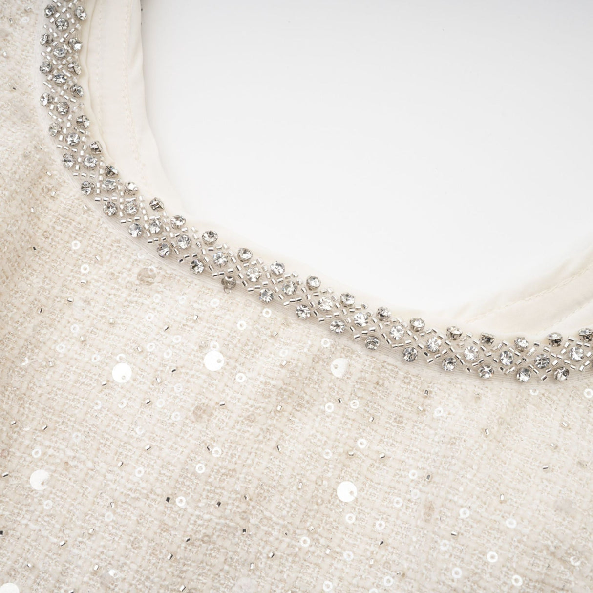 Brynn Mini Dress - Sleeveless with Sequin Detailing - Cut - Out Design - Crystal Embellishments - Bow Accent