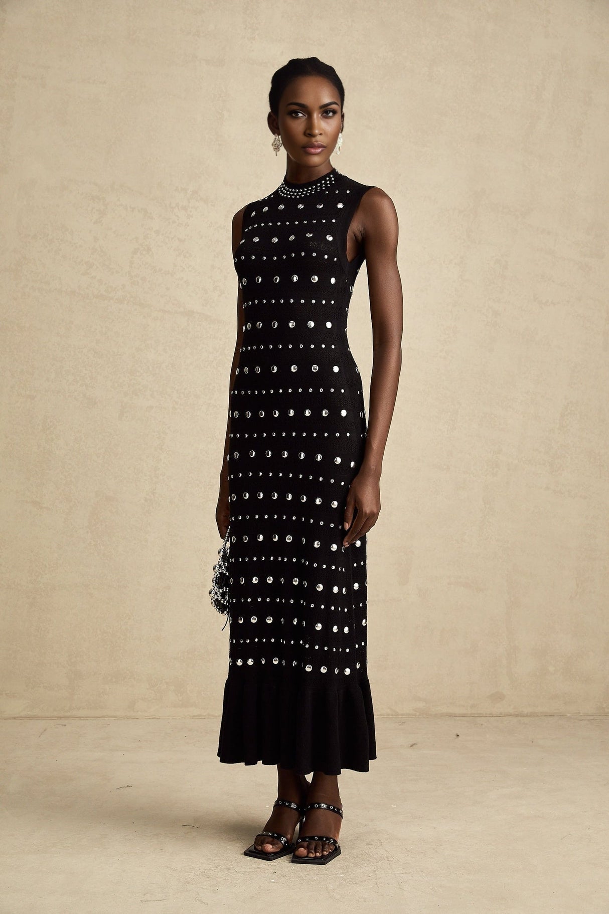 Cinzietta Maxi Dress - Crochet Knit - Crew Neck Style - Stud Embellishments - Ruffled Hem