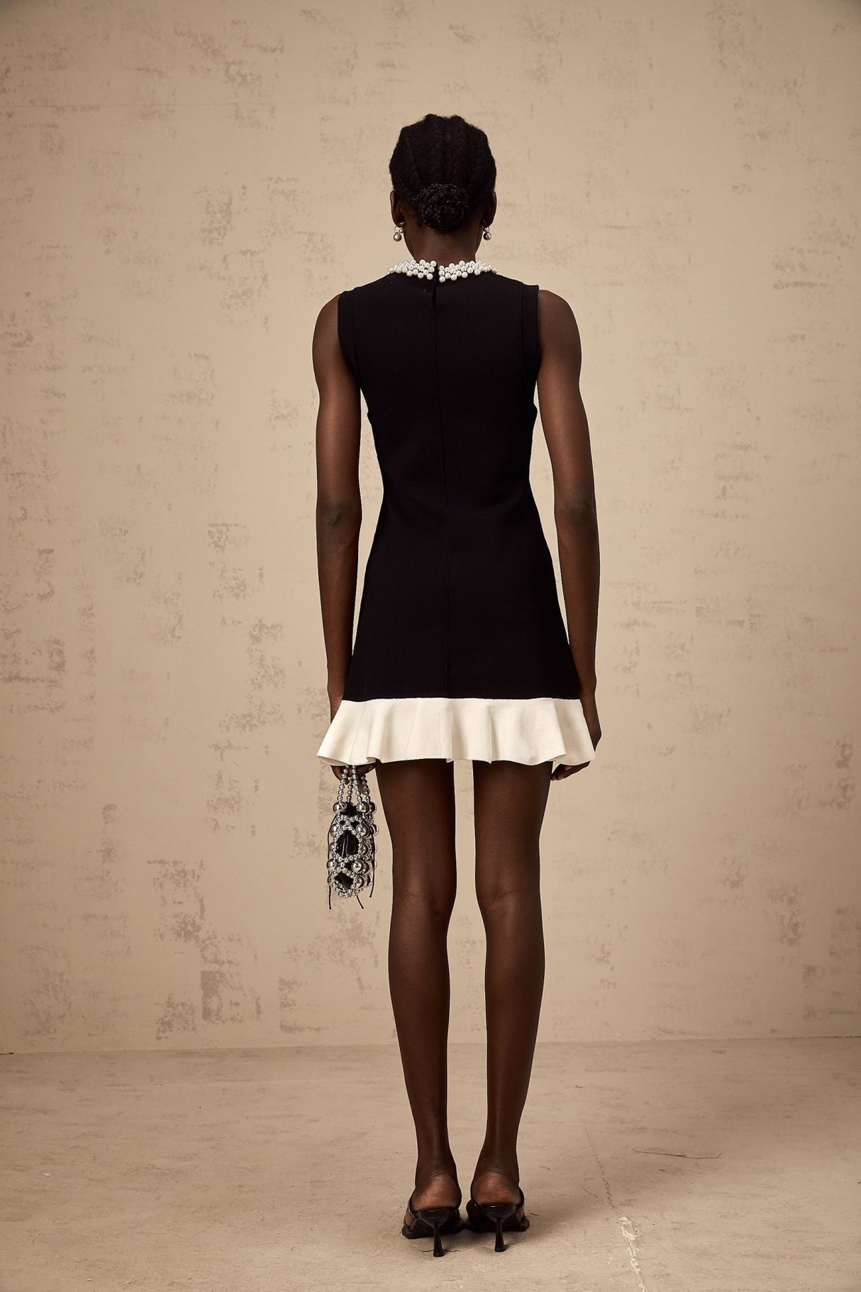 Concetta Mini Dress - Sleeveless Style - Knitted Construction - Ruffled Detailing - Contrast Colors - Faux - Pearl Embellishment