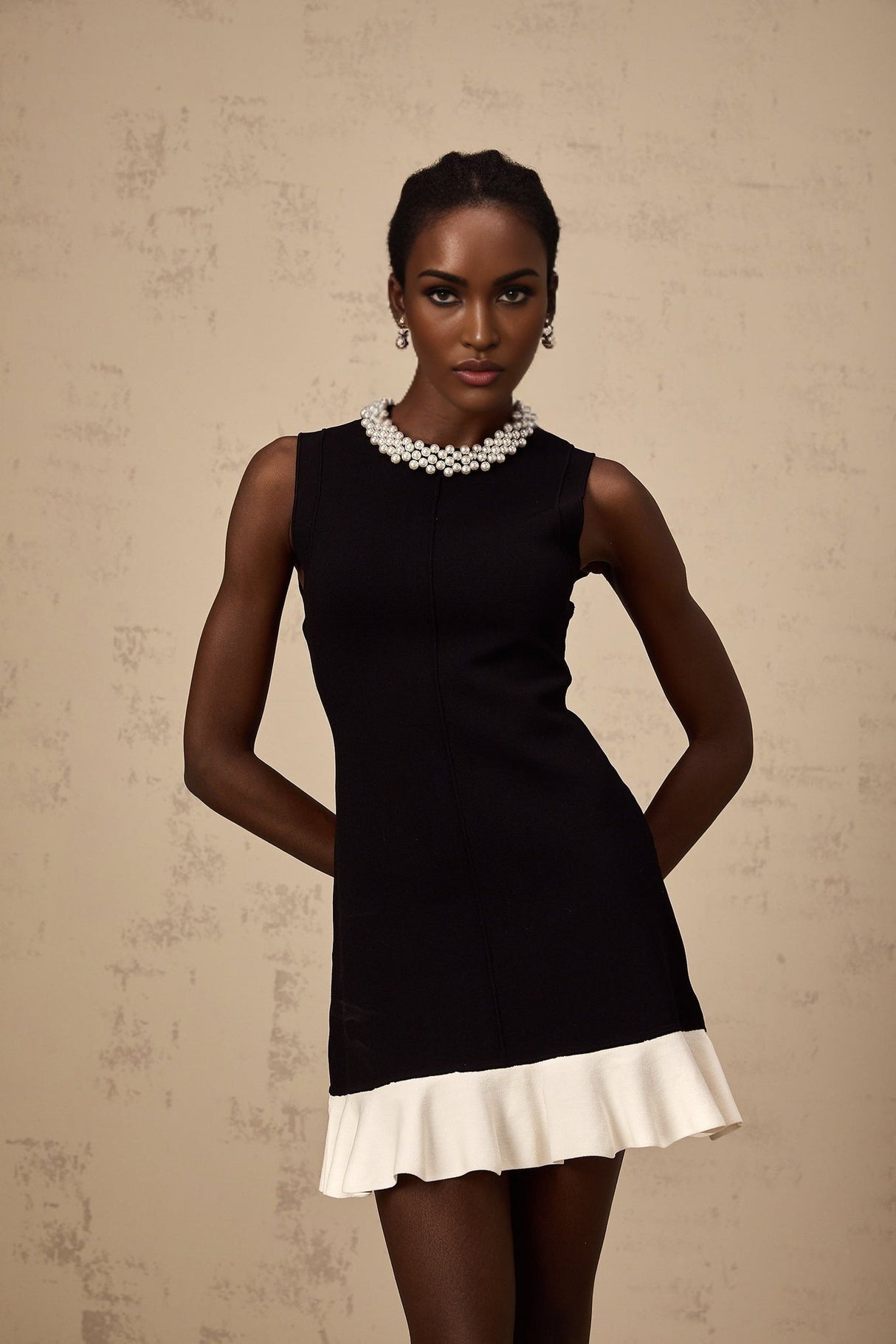 Concetta Mini Dress - Sleeveless Style - Knitted Construction - Ruffled Detailing - Contrast Colors - Faux - Pearl Embellishment