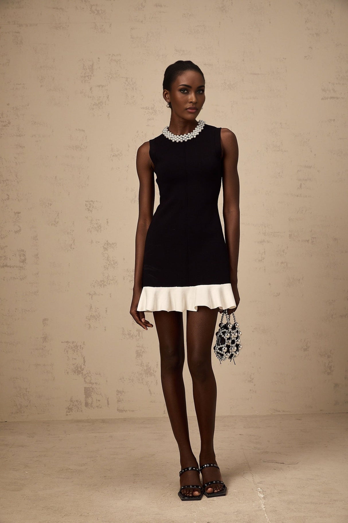 Concetta Mini Dress - Sleeveless Style - Knitted Construction - Ruffled Detailing - Contrast Colors - Faux - Pearl Embellishment