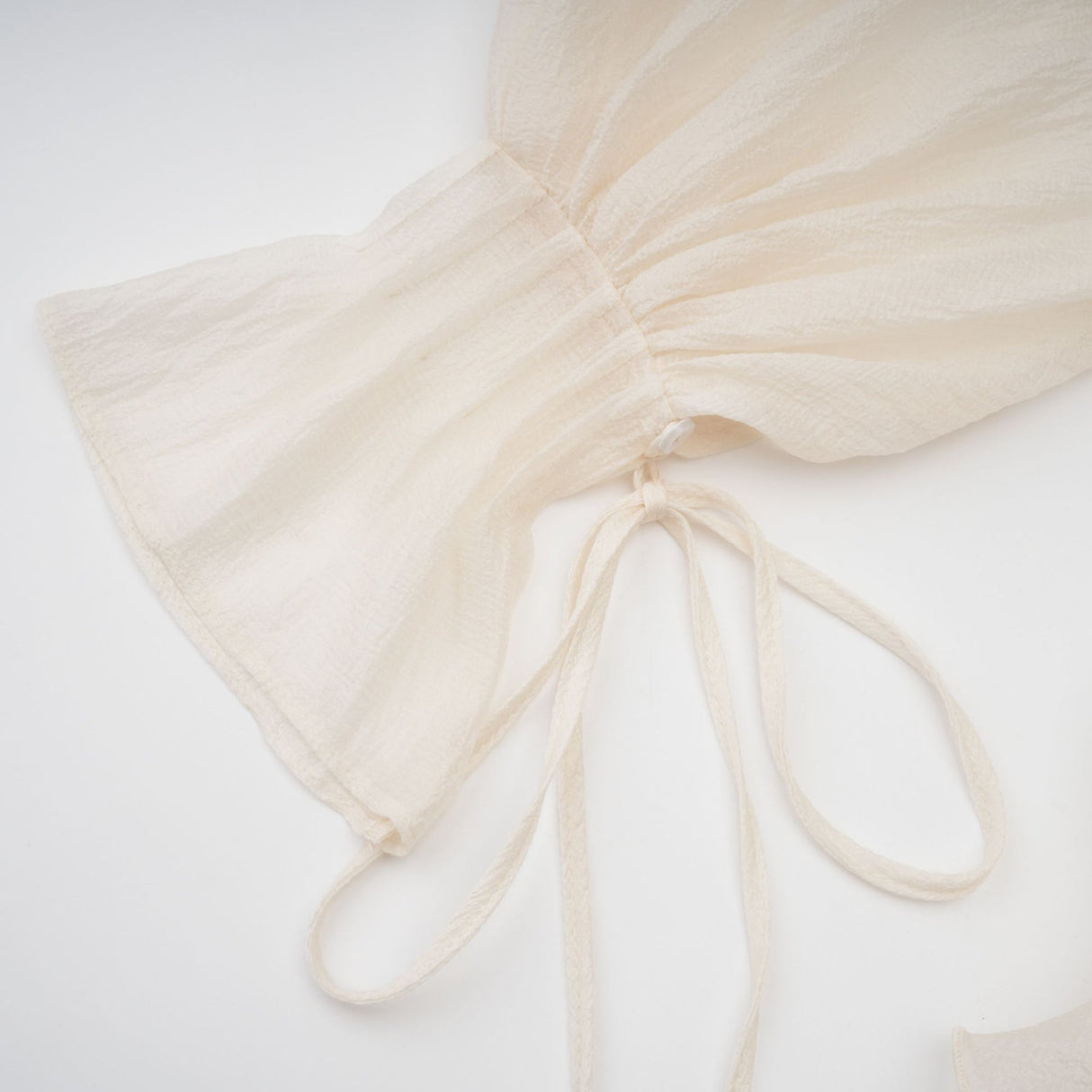 Debora Mini Dress – V - neck – Floral Appliqué – Ruffled Detailing