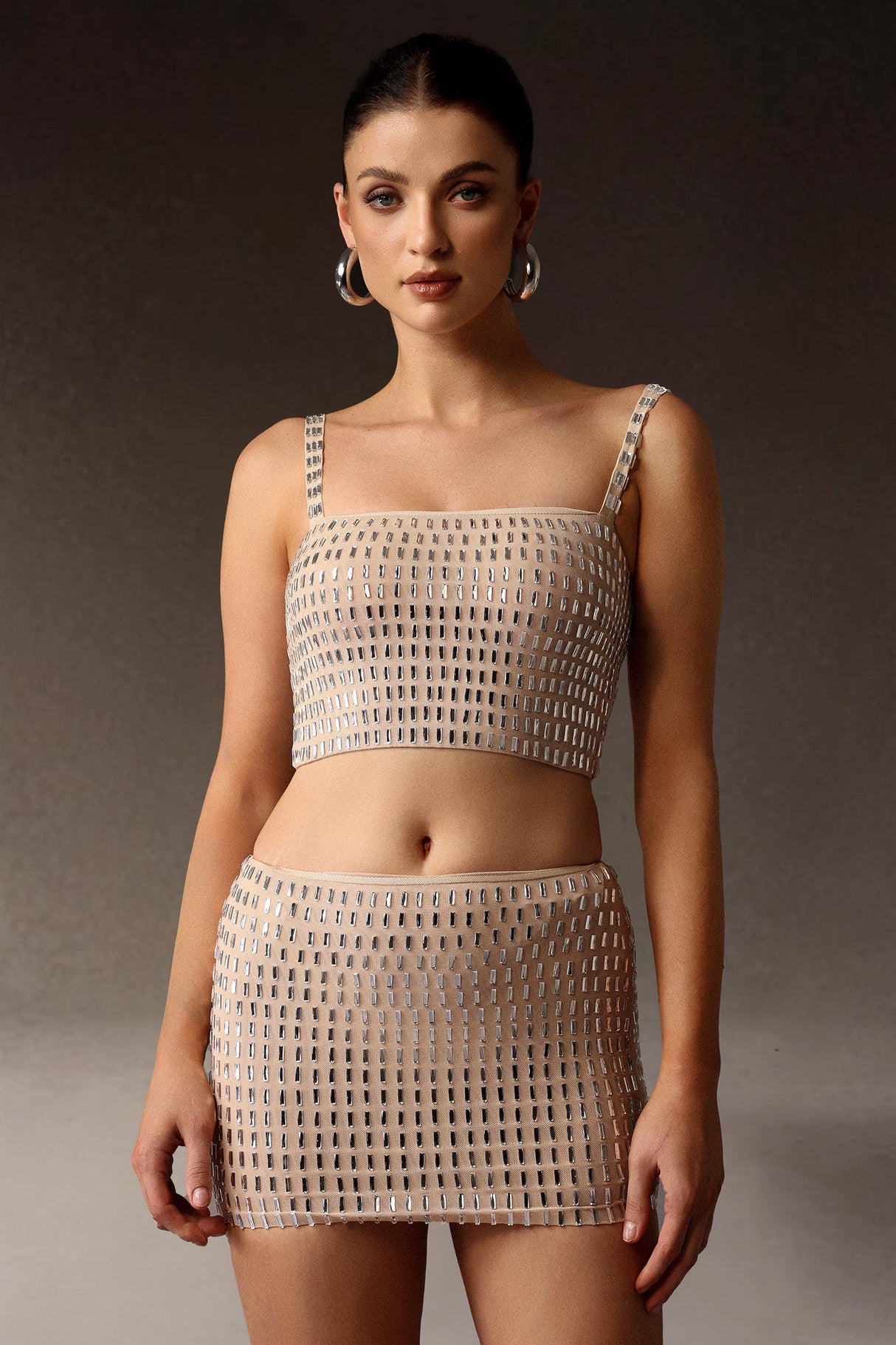 Delizia Beige Figure-Hugging Dress with Intricate Detailing and Elegant Neckline