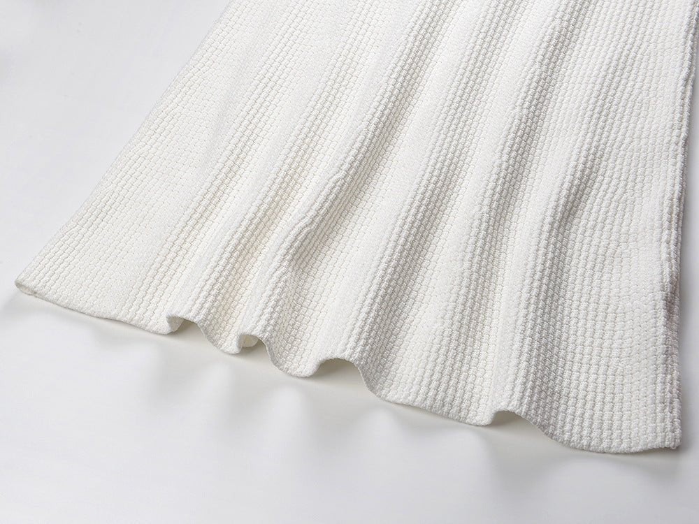 Dress - Fitted Silhouette With Flared Hem - Elegant Design With Pocket Detailing - Tailored Fit - Chic and Sophisticated Appearance