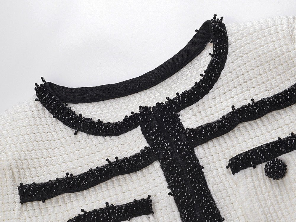 Dress - Fitted Silhouette With Flared Hem - Elegant Design With Pocket Detailing - Tailored Fit - Chic and Sophisticated Appearance