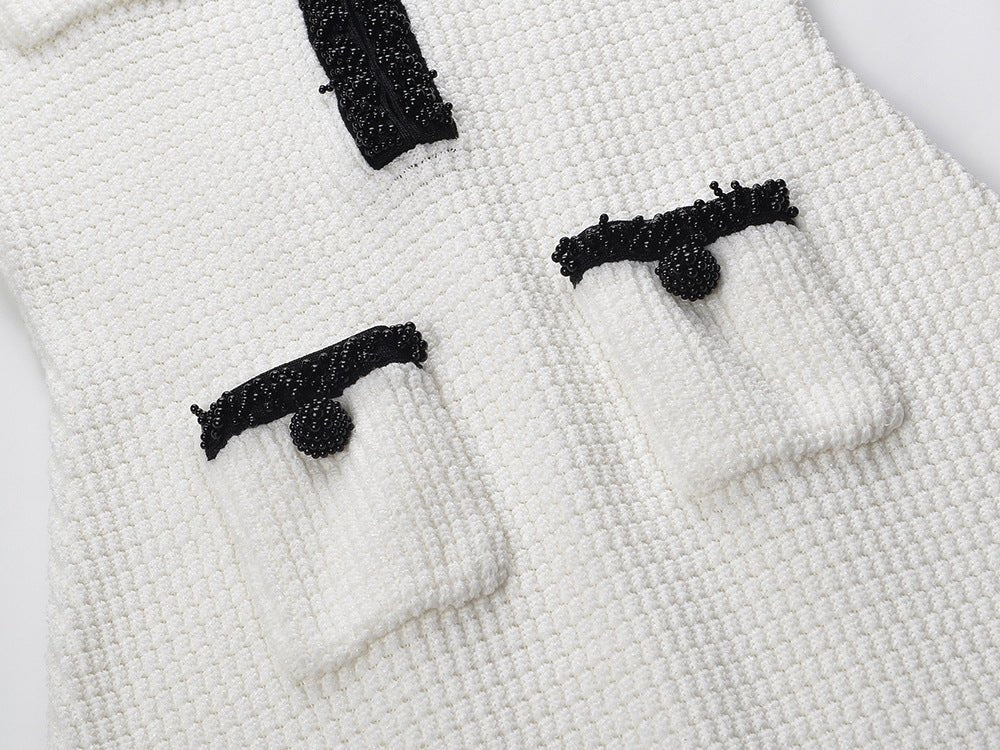 Dress - Fitted Silhouette With Flared Hem - Elegant Design With Pocket Detailing - Tailored Fit - Chic and Sophisticated Appearance