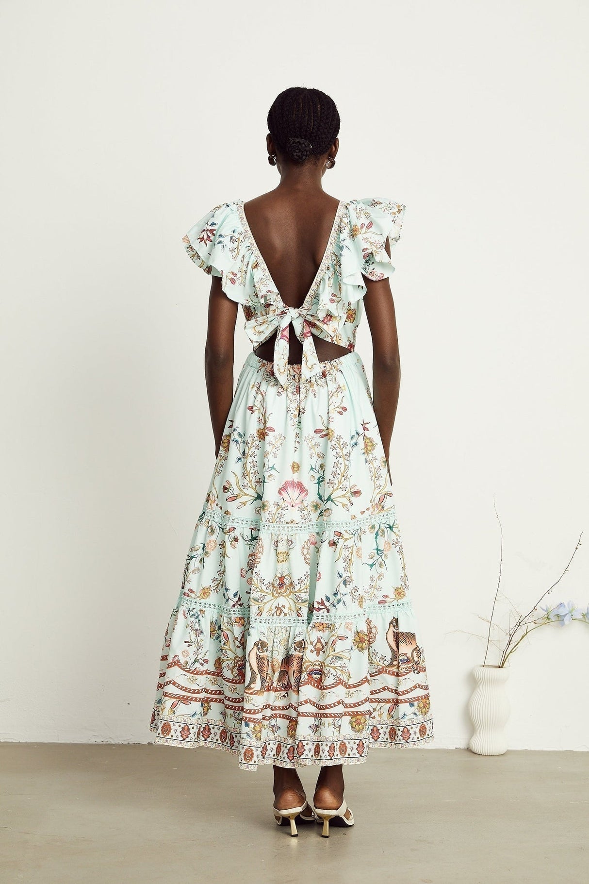 Geraldina Floral Maxi Dress - Plunging V - Neck - Open Back - Ruffled Detailing - Front Button and Self - Tie Fastening