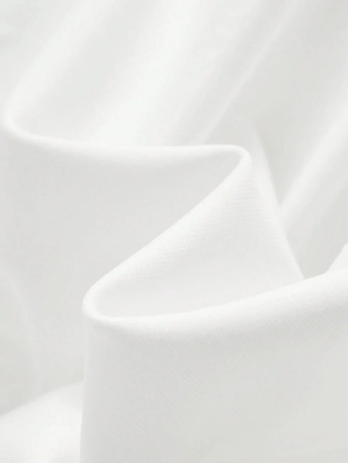 This stunning white dress features a soft, flowing fabric that drapes gracefully, creating an elegant and breathable fit.