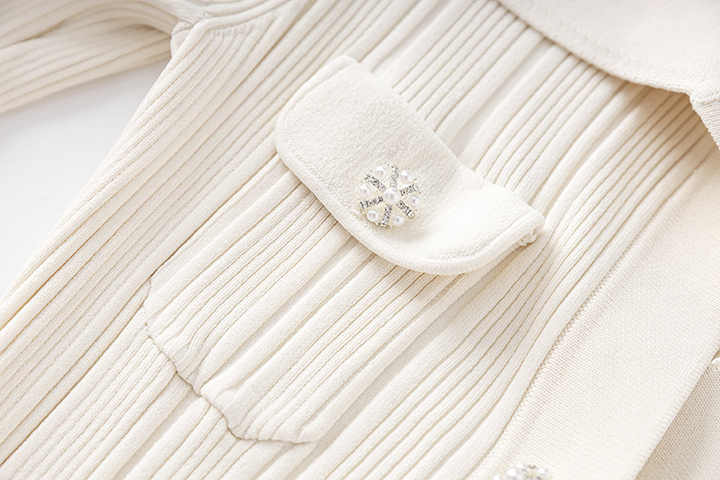 Haven Dress - Fitted Silhouette Flared Hemline - Button - Down Front Pockets - Form - Fitting Accentuates Waist - Lightweight Ribbed Knit Fabric