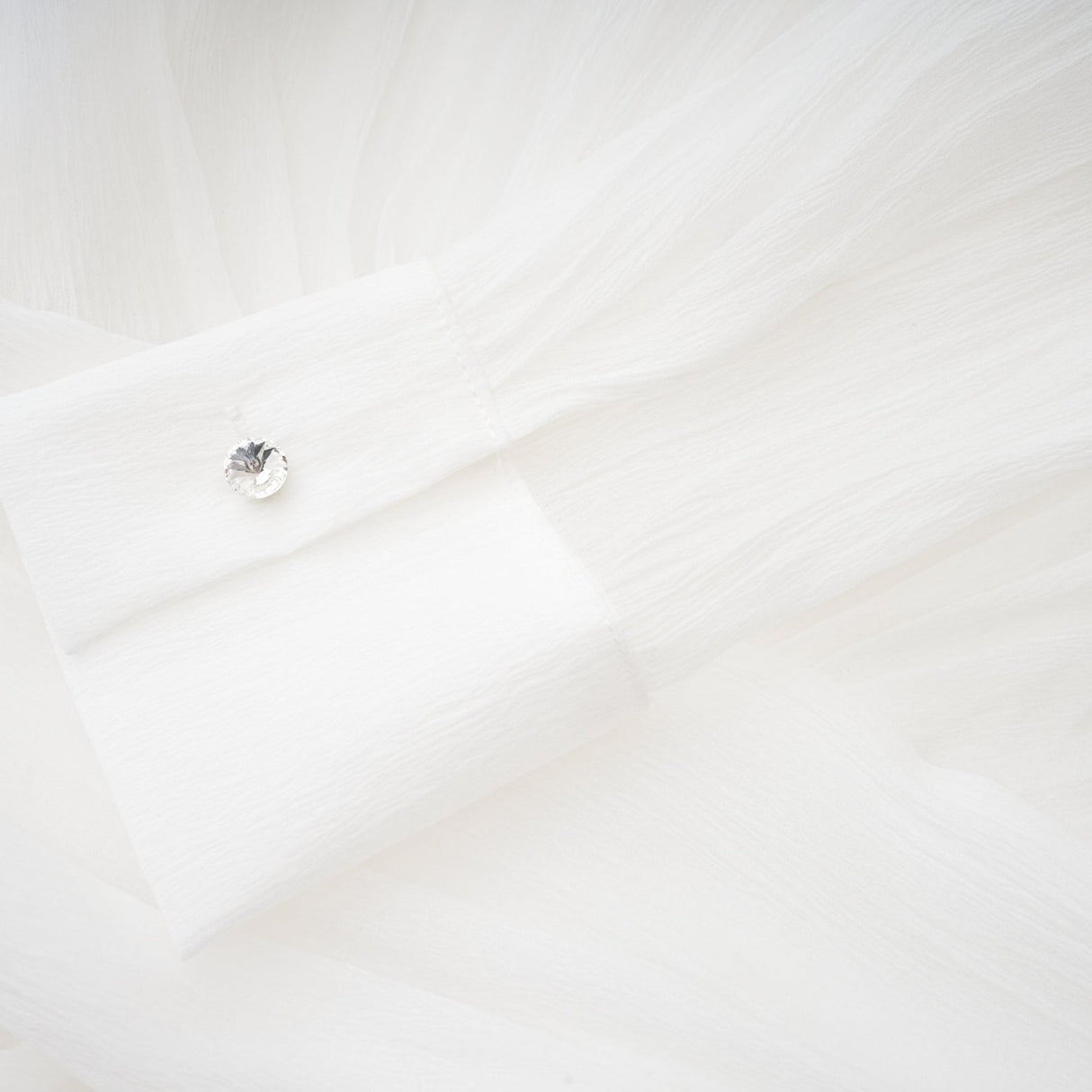 Jayla White Ruffled Blouse With Pointed Collar And Embellished Buttons