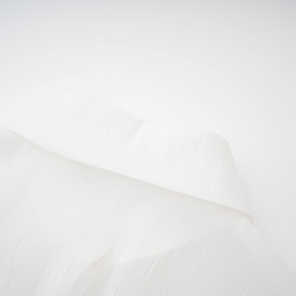 Jayla White Ruffled Blouse With Pointed Collar And Embellished Buttons