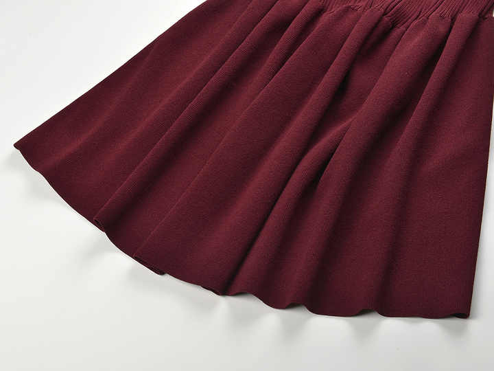 Laura Dress - Fitted Silhouette With Flare - Elegant Ribbed Design - Button Details - Tailored Fit With Flared Sleeves