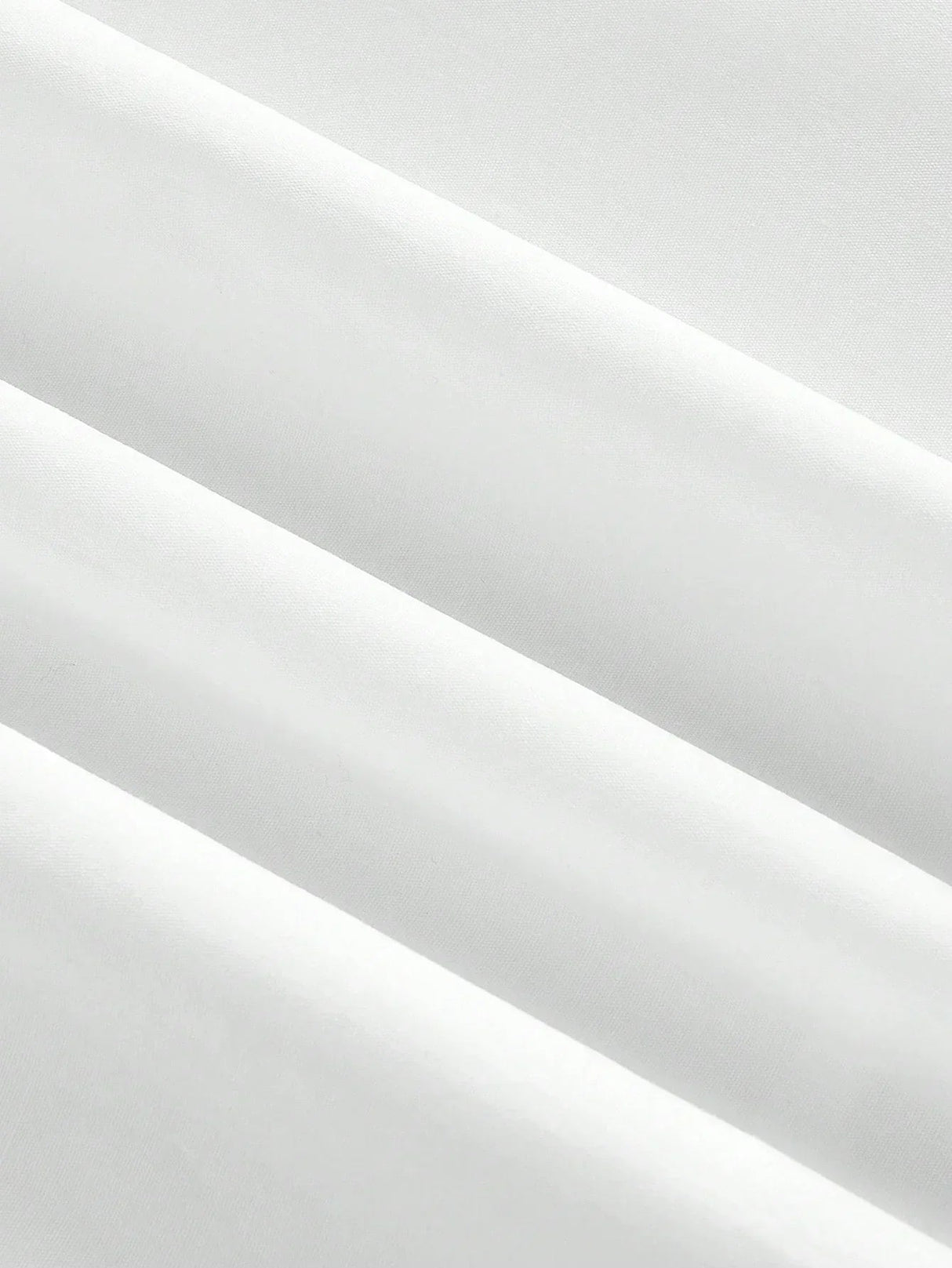 This elegant white dress features a flowing A-line silhouette crafted from soft, breathable fabric, perfect for any.