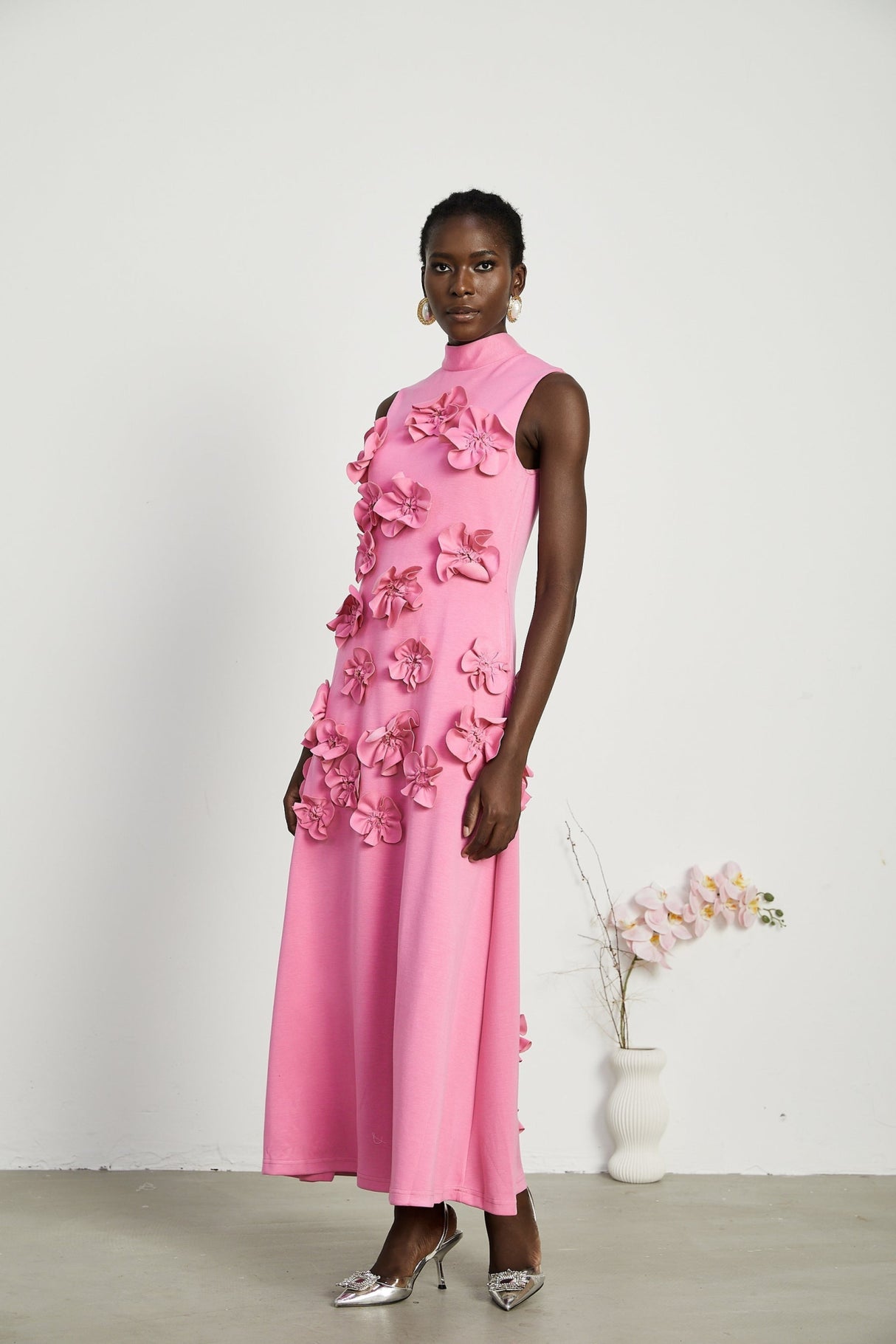 Lola Pink Maxi Dress with Faux - Flower Detail, Bow Neckline and Flounce Hem