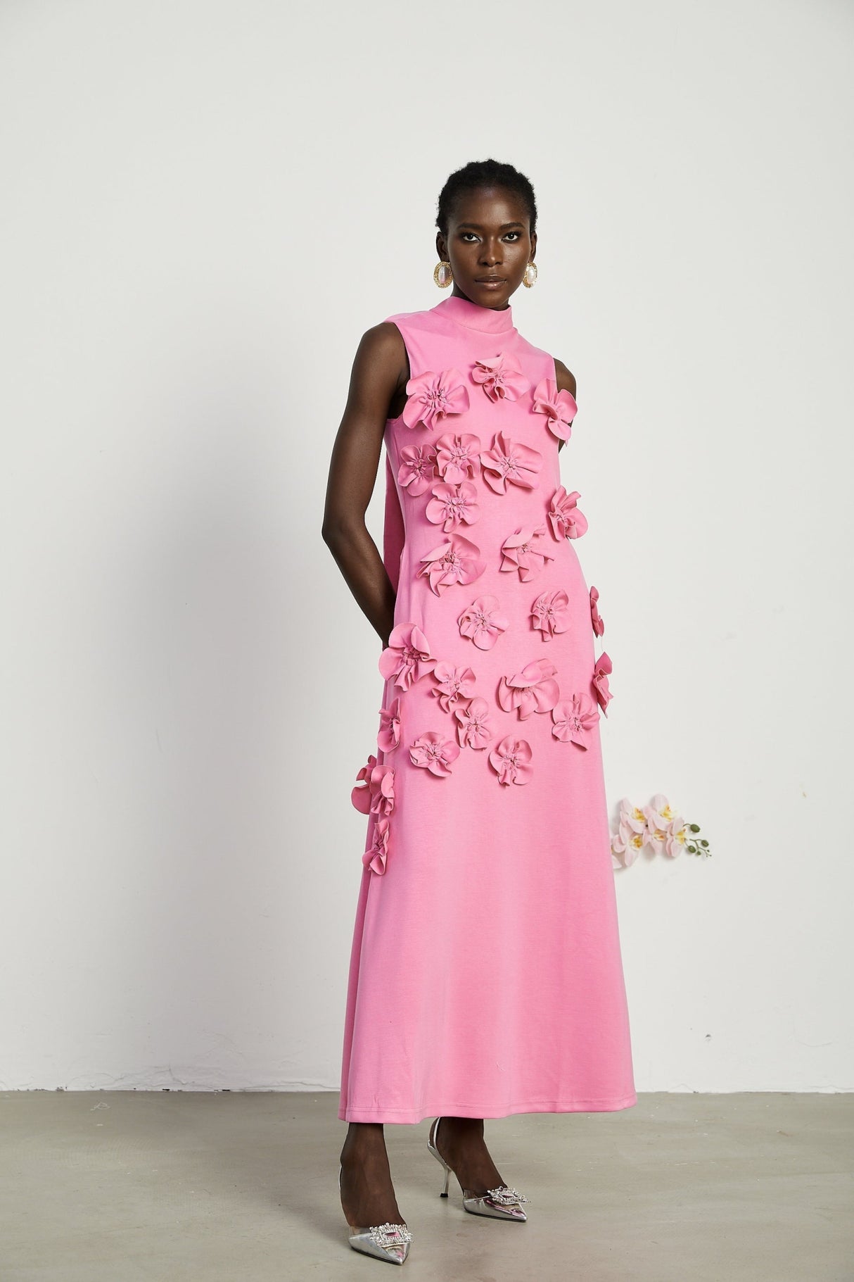 Lola Pink Maxi Dress with Faux - Flower Detail, Bow Neckline and Flounce Hem