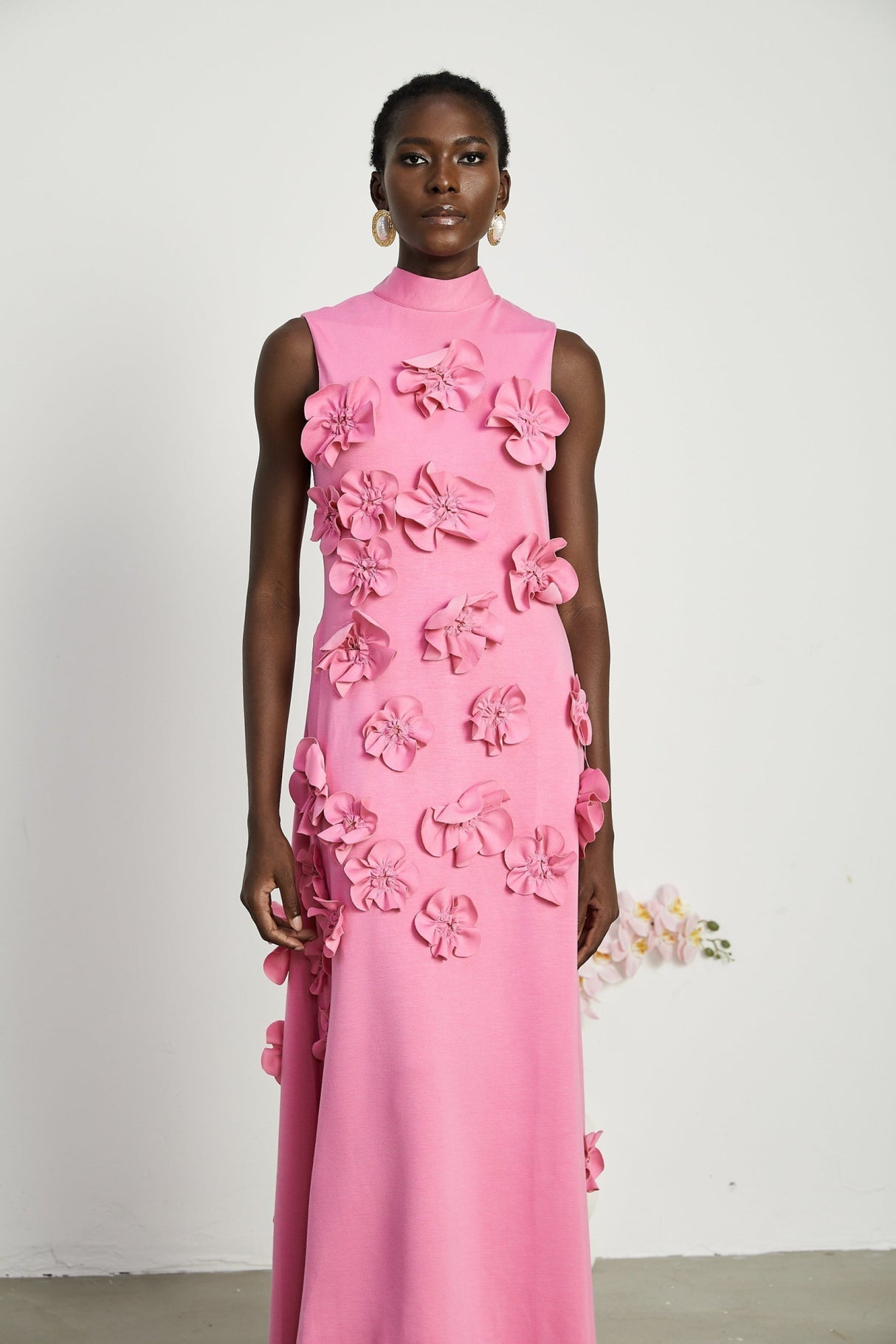Lola Pink Maxi Dress with Faux - Flower Detail, Bow Neckline and Flounce Hem