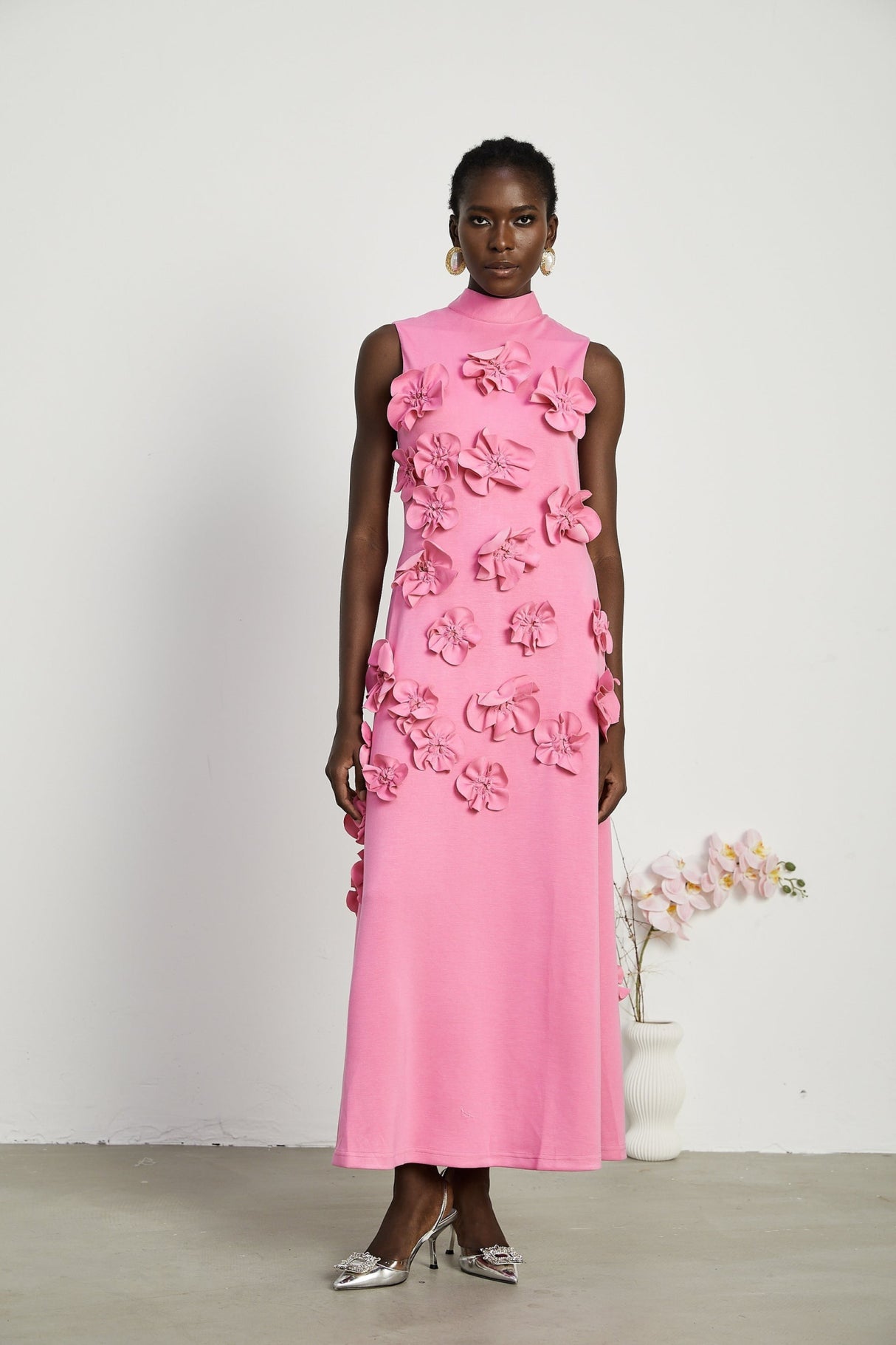 Lola Pink Maxi Dress with Faux - Flower Detail, Bow Neckline and Flounce Hem
