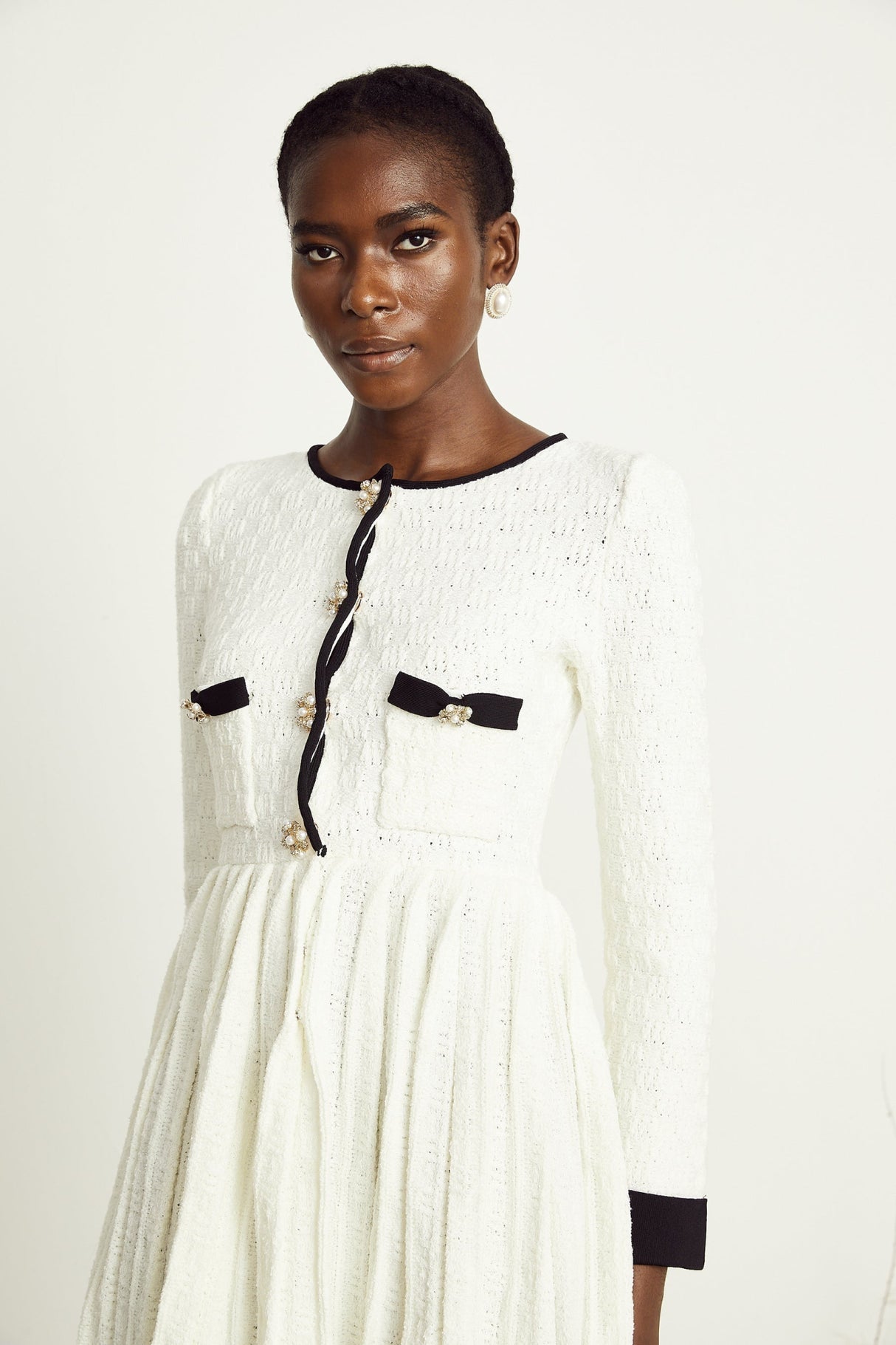 Lorelai Mini Dress White Black Ribbed Knit Pleated Trim & Pockets