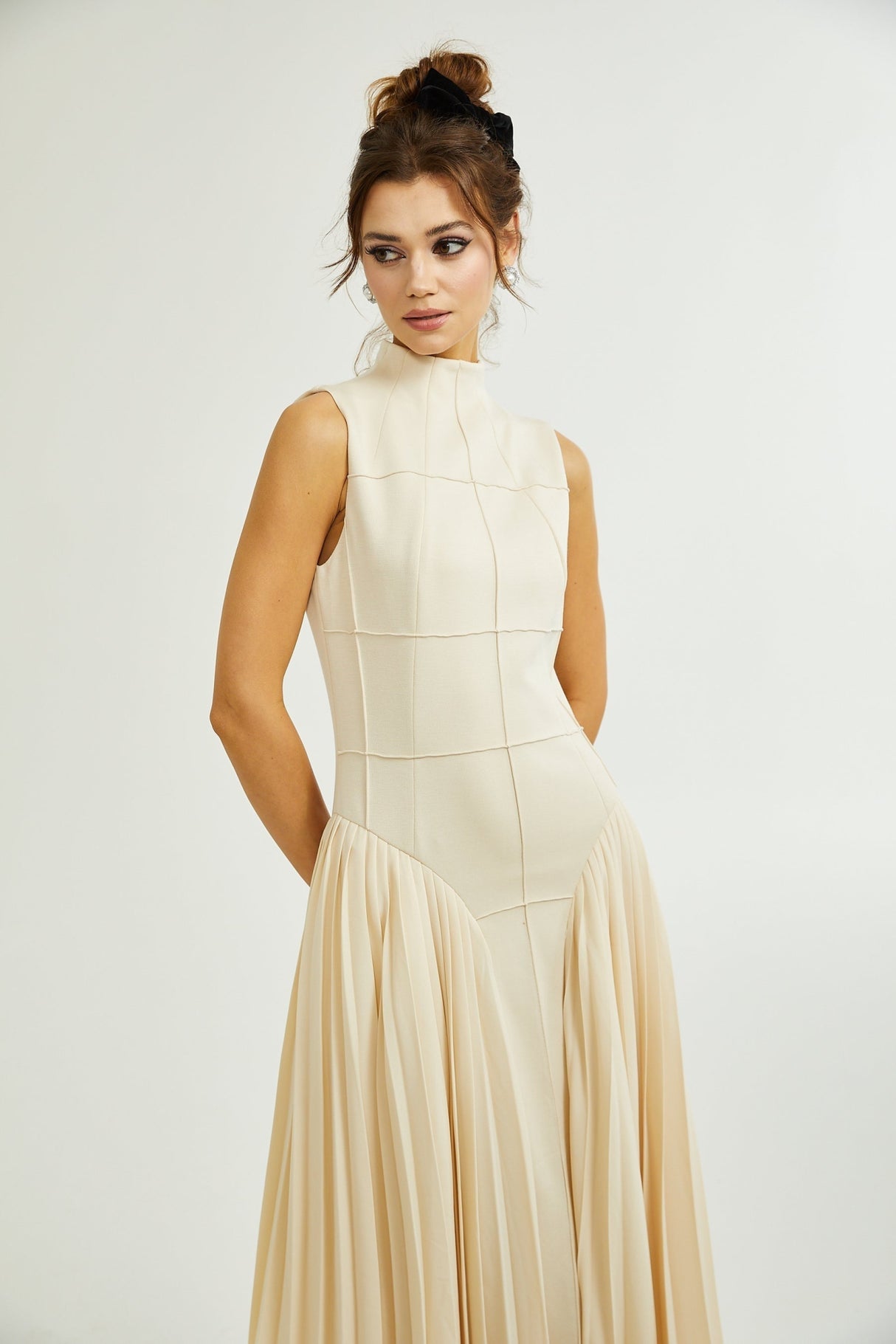 Madalynn Sleeveless Mock Neck Pleated Knitted Midi Dress