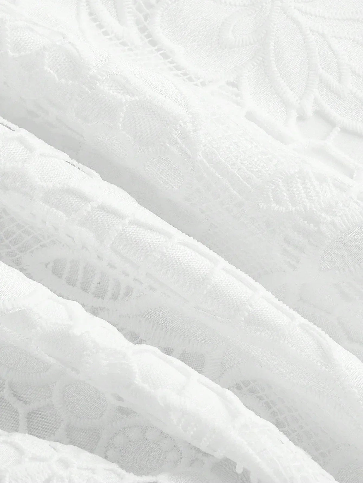 This elegant white dress features intricate lace detailing that adds a romantic touch, making it perfect for special.