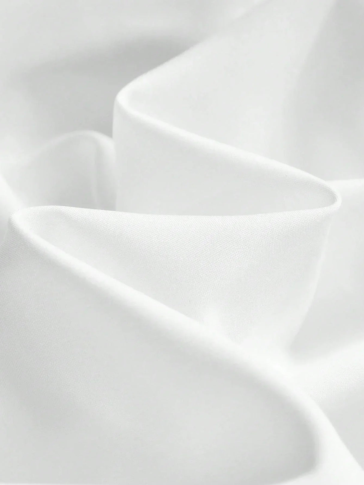 Experience elegance with this flowing white dress, crafted from a soft, lightweight fabric that drapes beautifully for a.