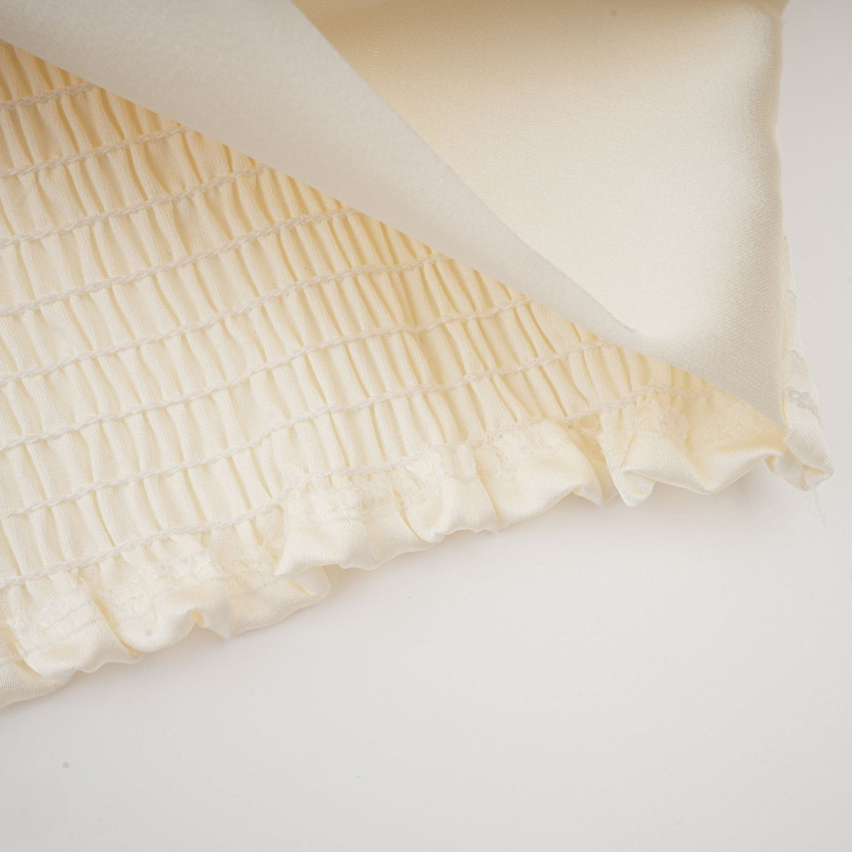 Nouria White Satin Cropped Blouse With Twist Front and Smocked Hem