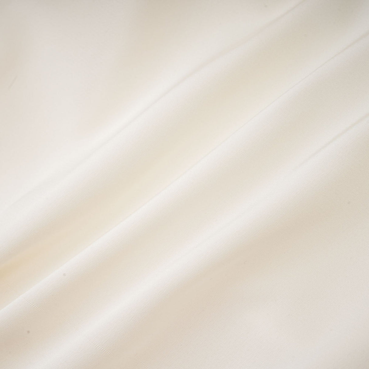 Nouria White Satin Cropped Blouse With Twist Front and Smocked Hem