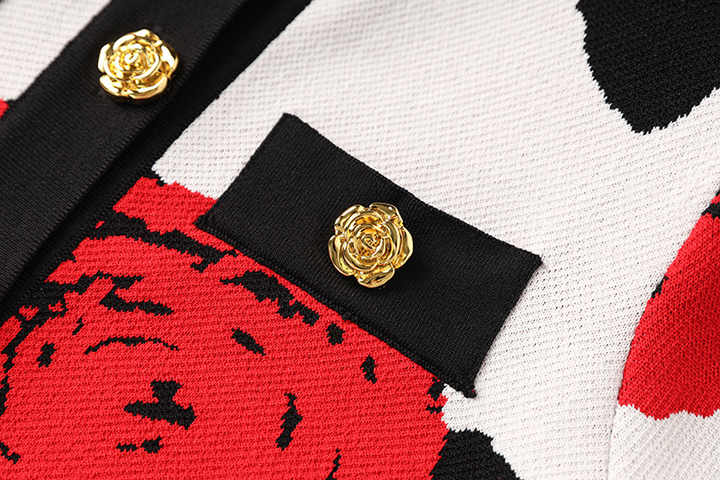 Paola Top – Short Sleeve Boxy Fit – Floral Pattern – Gold Button Detail – Decorative Pockets – Textured Knit Fabric – Casual Style