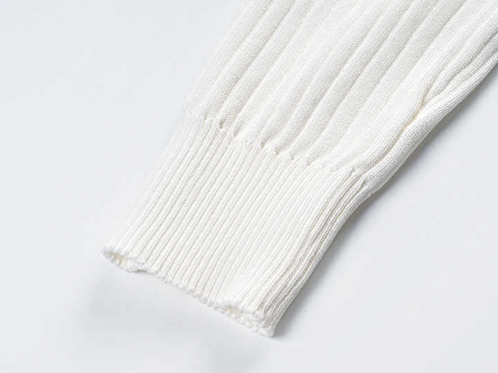 Raven Top – Fitted Ribbed Knit – Collared Design – Gold Button Accents – Decorative Pockets – Tailored Silhouette – Stretch Fabric