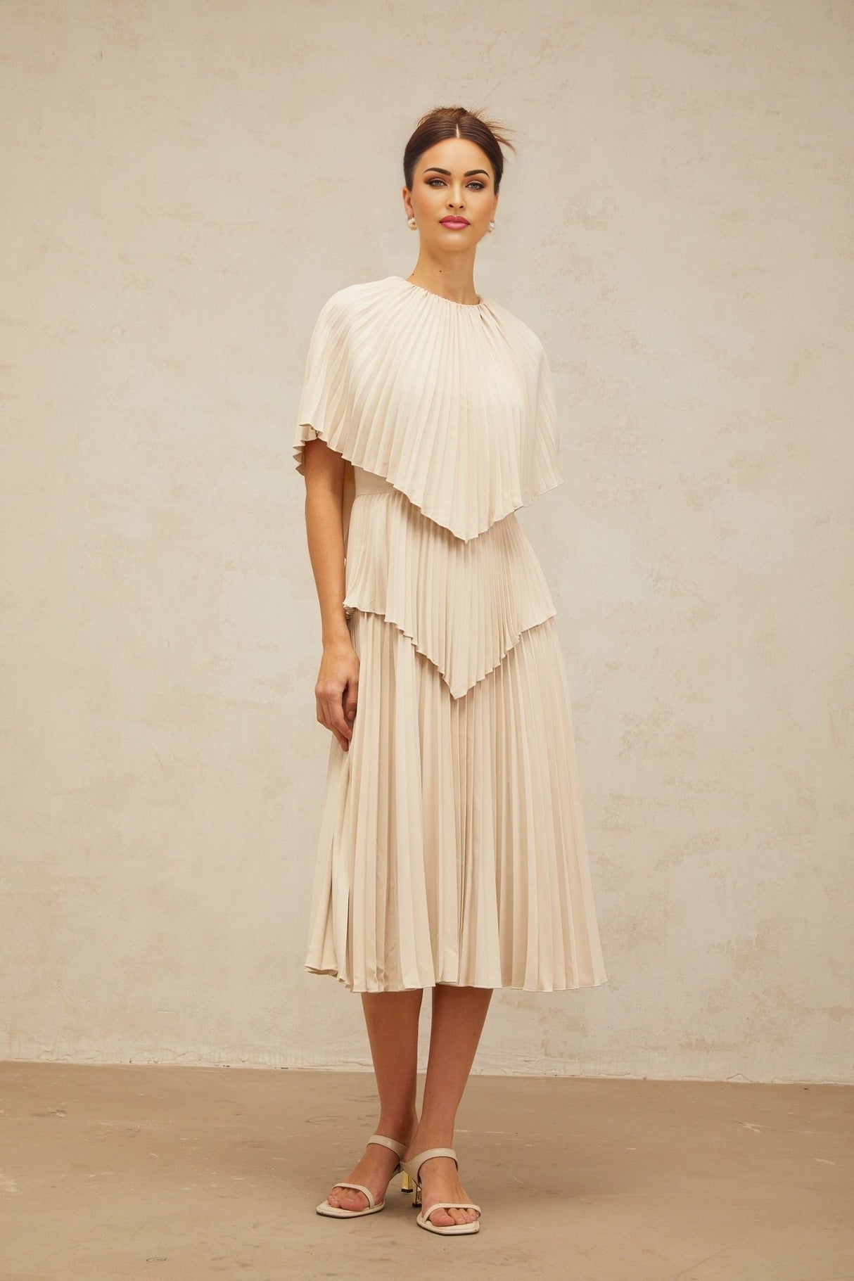 Serafina Midi Dress in Neutrals Crew Neck Batwing Pleated Cape Zip Calf Length