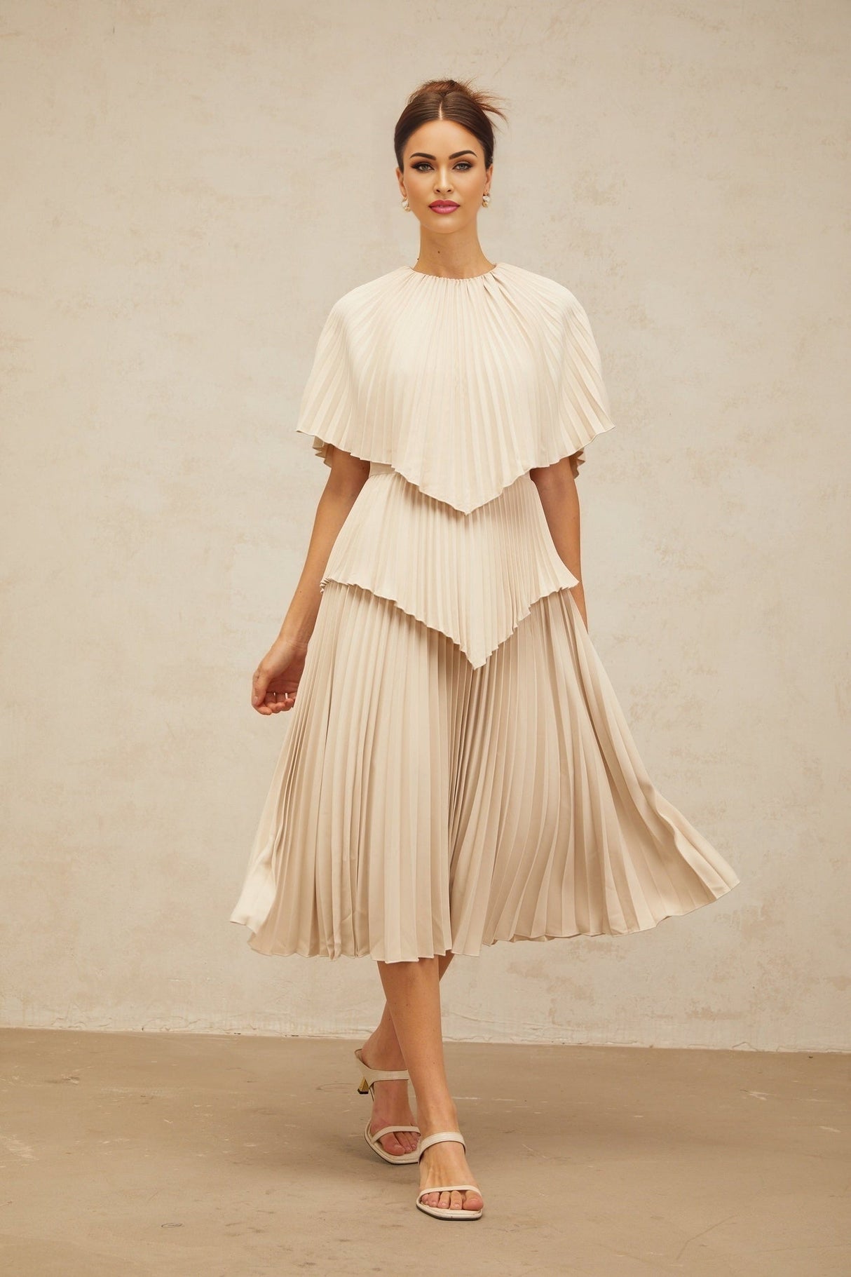Serafina Midi Dress in Neutrals Crew Neck Batwing Pleated Cape Zip Calf Length