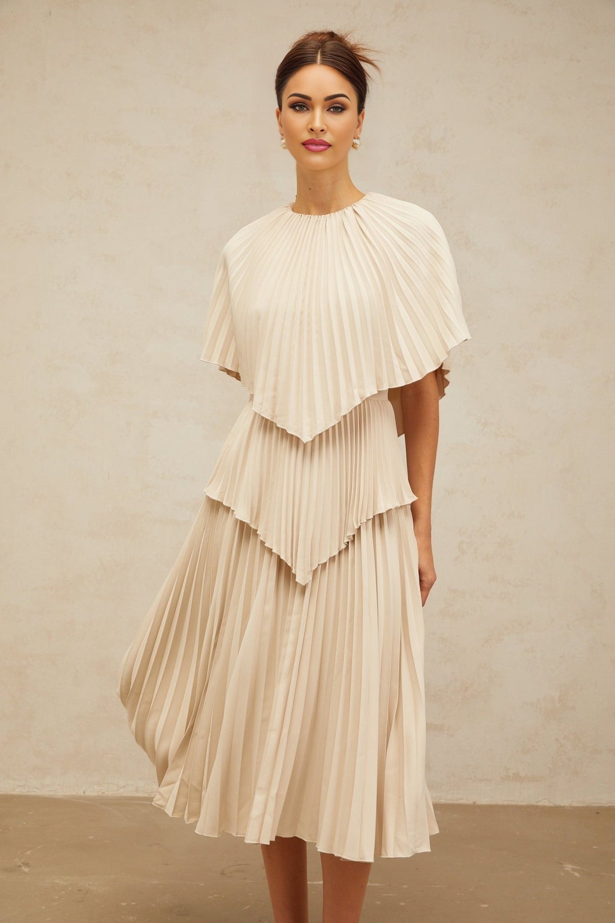 Serafina Midi Dress in Neutrals Crew Neck Batwing Pleated Cape Zip Calf Length