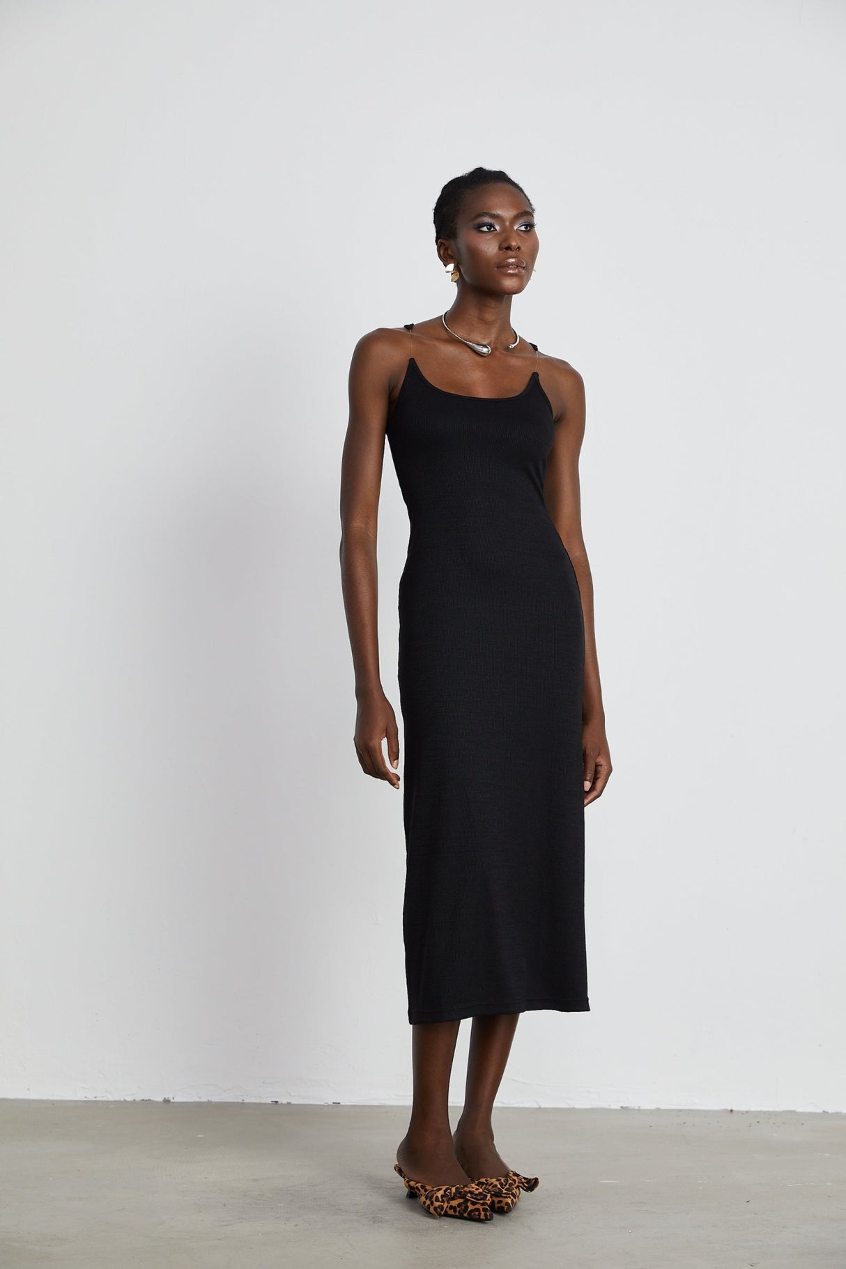 Ursula Maxi Dress in Confident Black with Transparent Straps & Low - Cut Design