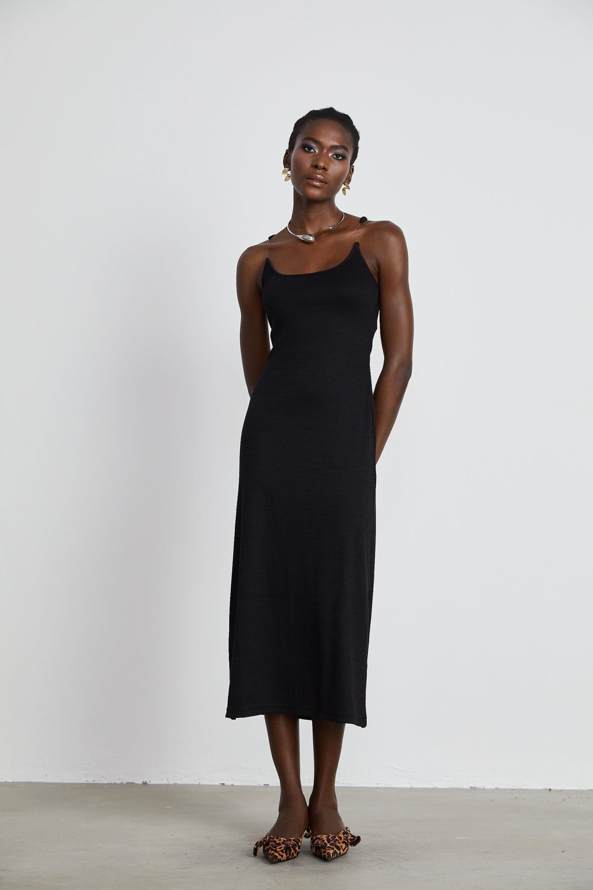Ursula Maxi Dress in Confident Black with Transparent Straps & Low - Cut Design