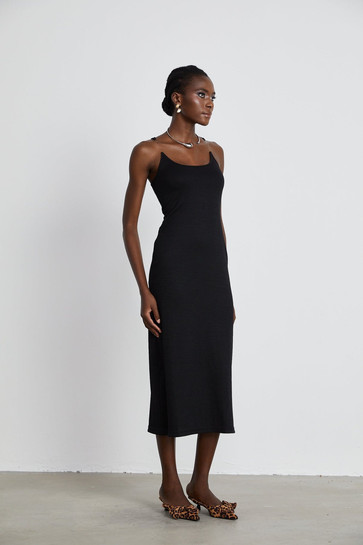Ursula Maxi Dress in Confident Black with Transparent Straps & Low - Cut Design