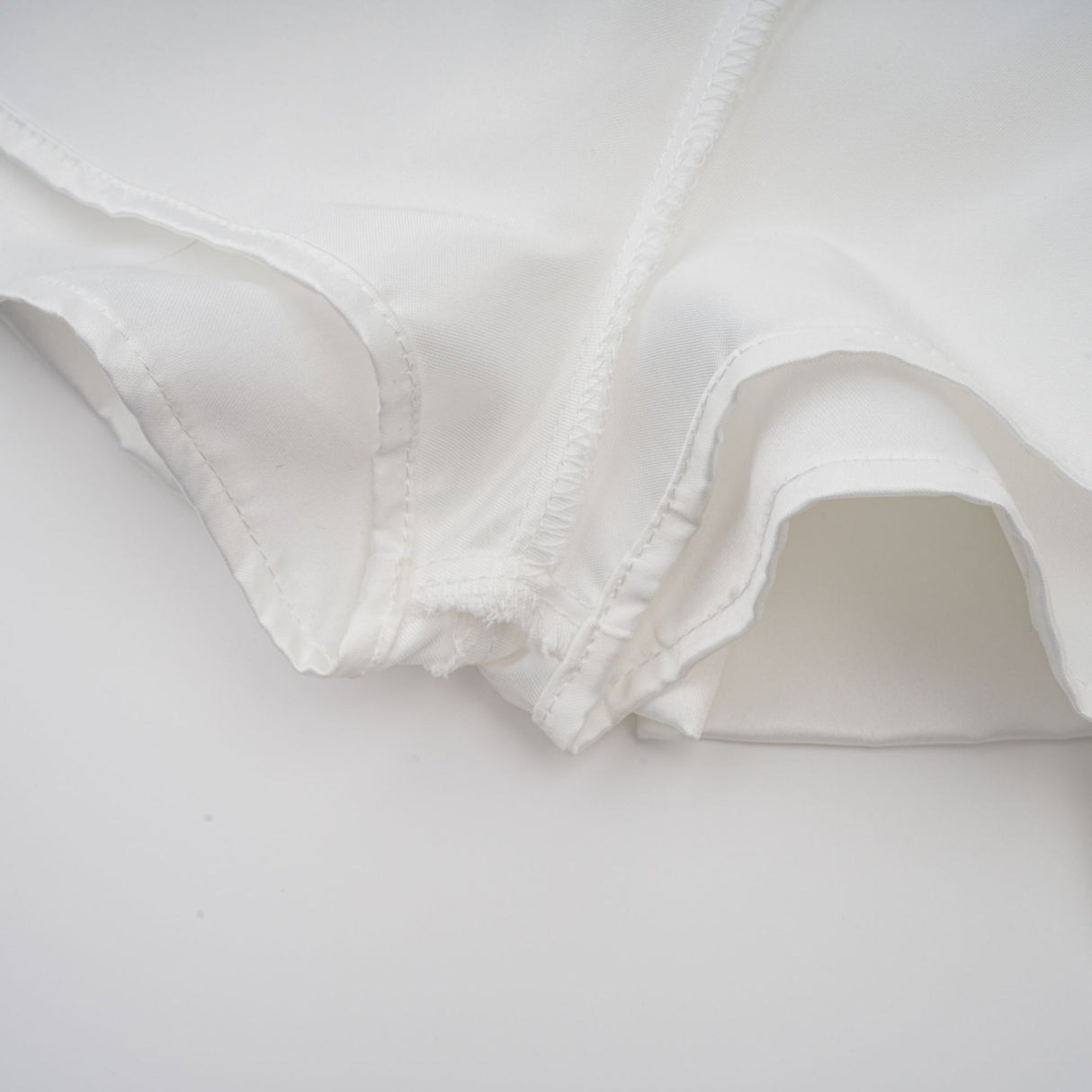 Violetta Mini Dress White Halterneck Ruffled Hem Zip Included