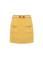 Sophia embellished tweed mini skirt in vibrant yellow with a high-waisted fit, crystal embellishments, gemstone belt, and front pocket details, crafted from 100% polyester.