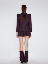 A-line wool-blend mini skirt with shimmer detailing, an elastic waistband, and a flattering high-waisted design. Made from 94.3% polyester, 5.7% wool, and lined with 100% polyester