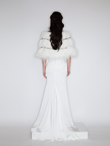 Sophia asymmetric white evening dress with a delicate bow detail, flowing silhouette, and layered hemline, crafted from lightweight polyester.
