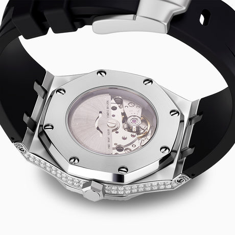Close-up of a watch with a black strap and silver case on a white background