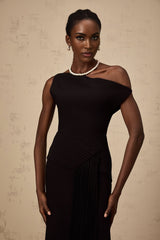A black asymmetric midi dress with draped fabric details named Laurine shown on a model or mannequin
