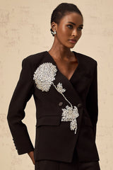A black blazer with a floral pattern featuring embellished flower motifs named Therese