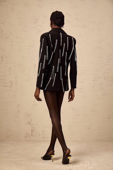 A black blazer with crystal tassels adorning the design elegant and formal outerwear for women