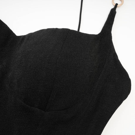 A black bustier midi dress called Ailbhe featuring a fitted bodice and flowing skirt
